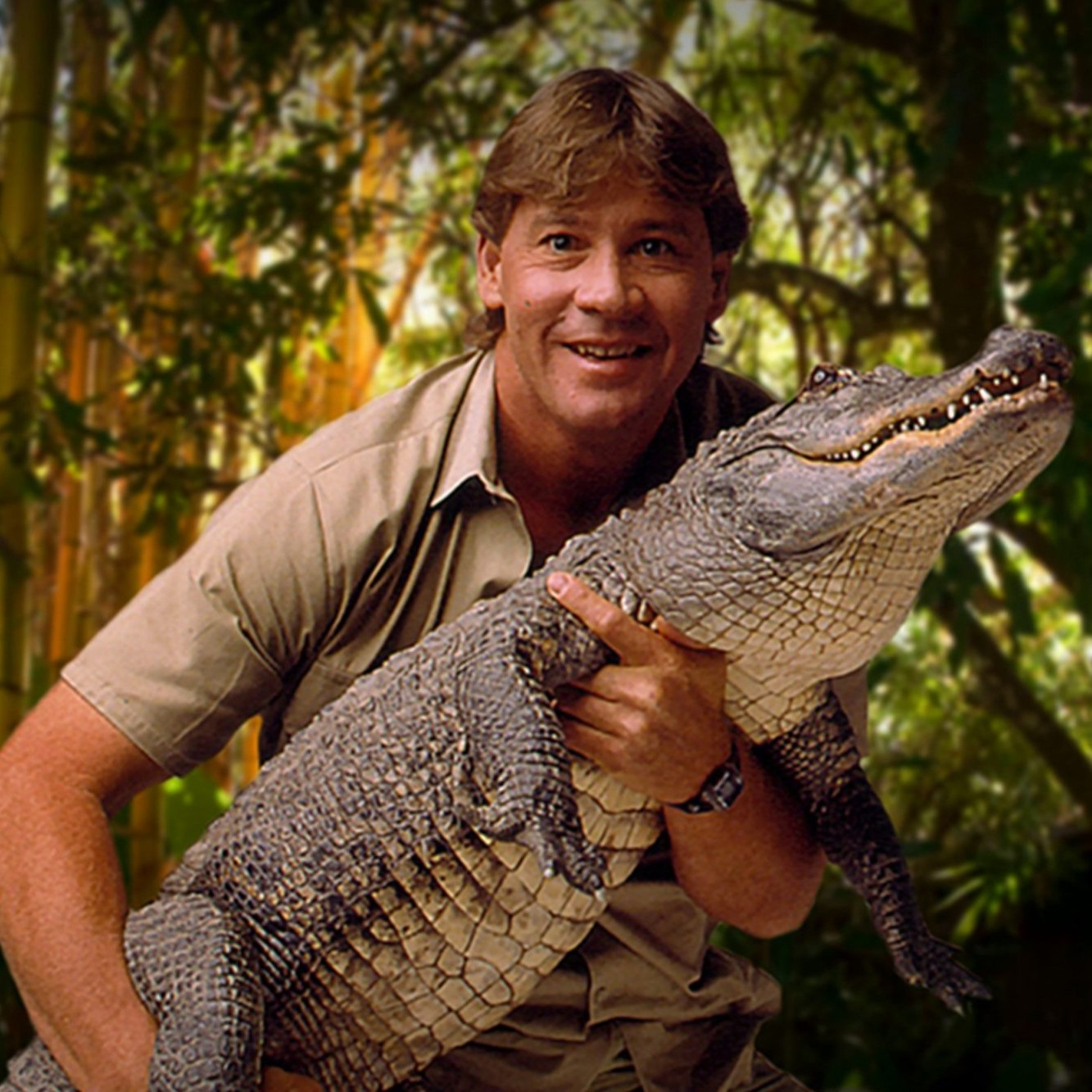 Steve Irwin holding a crocodile